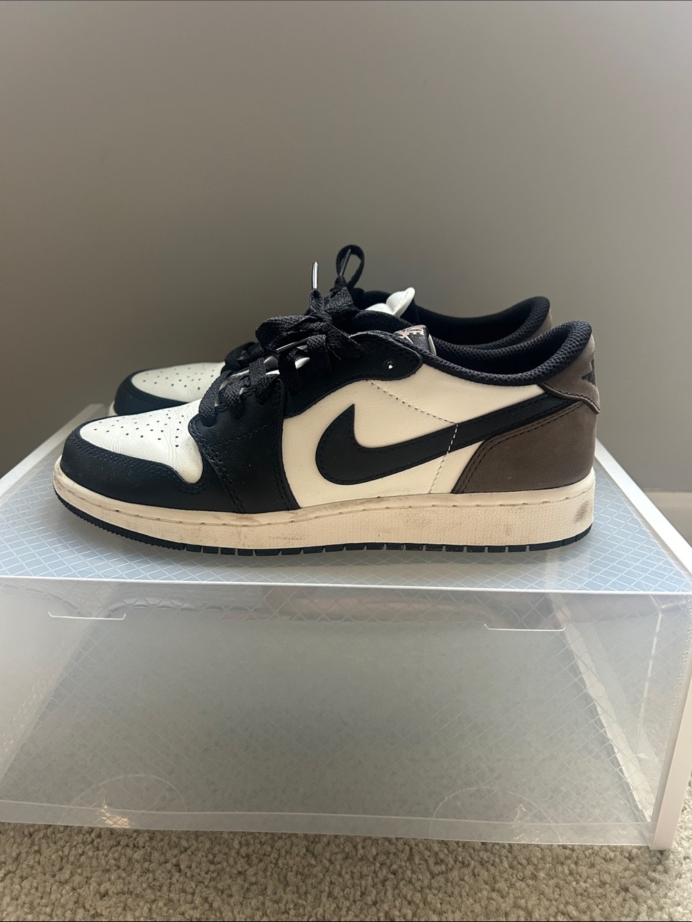 Nike Youth Jordan 1 low in Black, White, and Brown